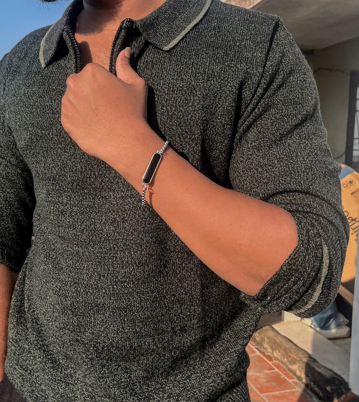 Black dotted bracelet and square chain